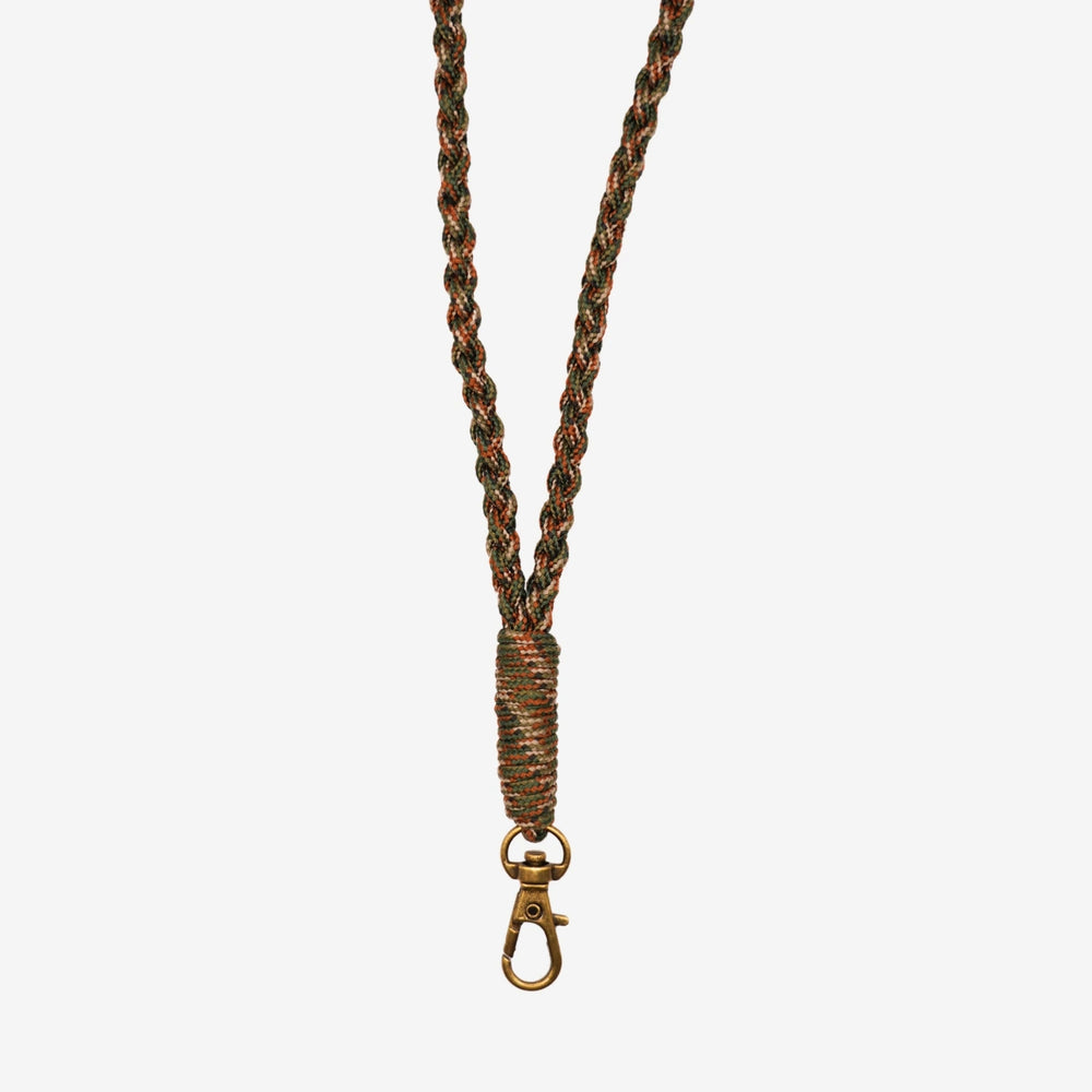 Junies flätat visselpipsband grön mönstrad närbild #color_armygreen-patterned