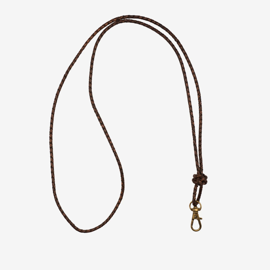 Flätat visselpipsband i brunt läder med knut från junies #color_brown