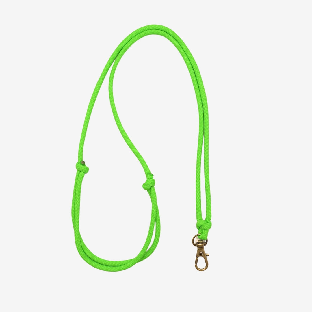 JUNIES visselpipsband Enkel neon green med hake 