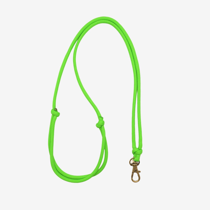 JUNIES visselpipsband Enkel neon green med hake 
