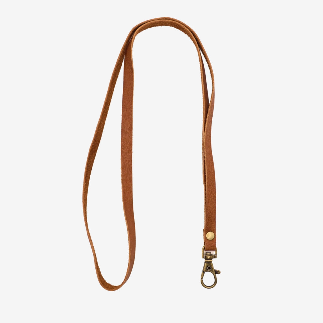 Junies visselpipsband svenskt läder cognac #color_cognac