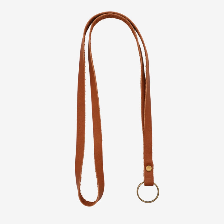 Junies visselpipsband svenskt läder cognac #color_cognac