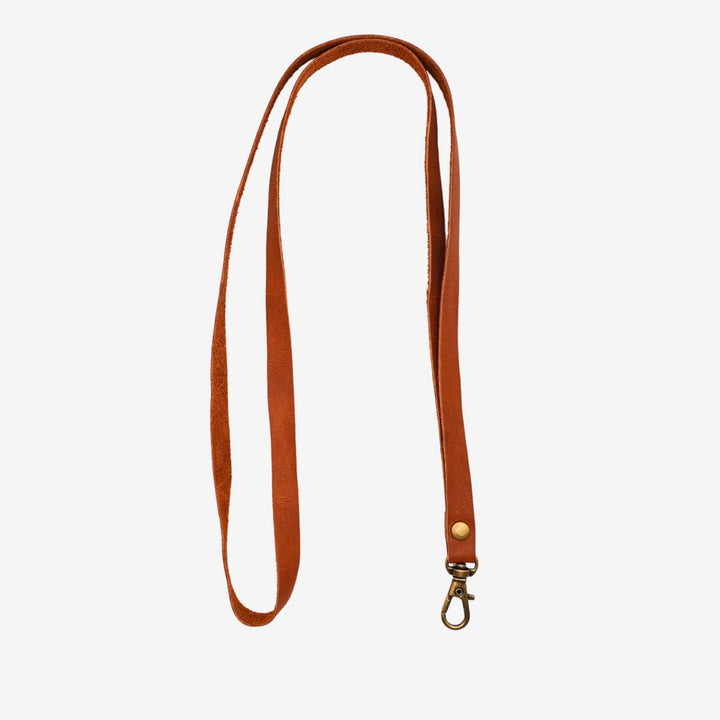 Junies visselpipsband svenskt läder cognac #color_cognac
